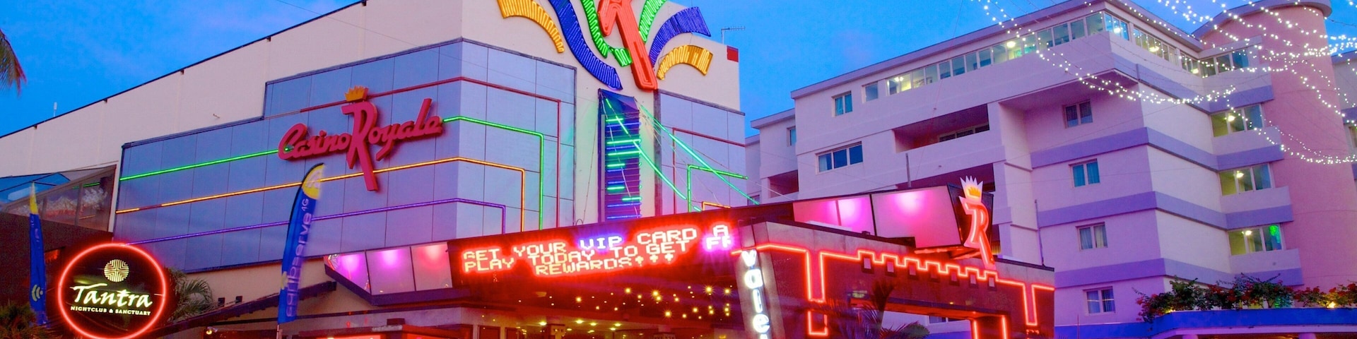 Casino Royale which includes a casino, signage and a city