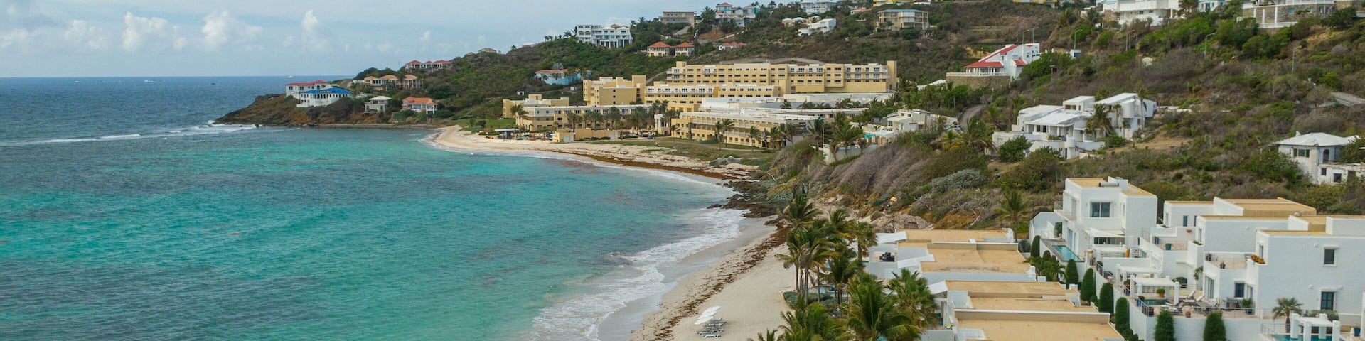 Dawn Beach which includes landscape views, general coastal views and a coastal town