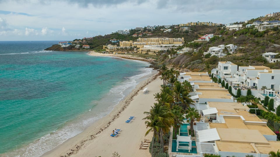 Dawn Beach which includes landscape views, general coastal views and a coastal town
