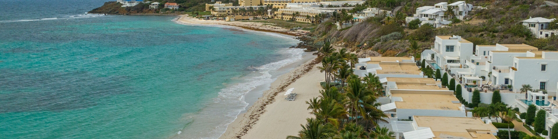 Dawn Beach which includes landscape views, general coastal views and a coastal town