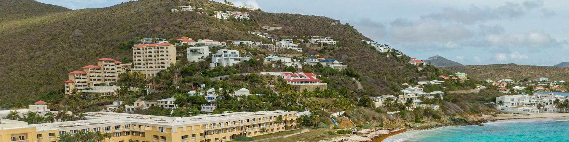 Dawn Beach featuring landscape views, a coastal town and a beach
