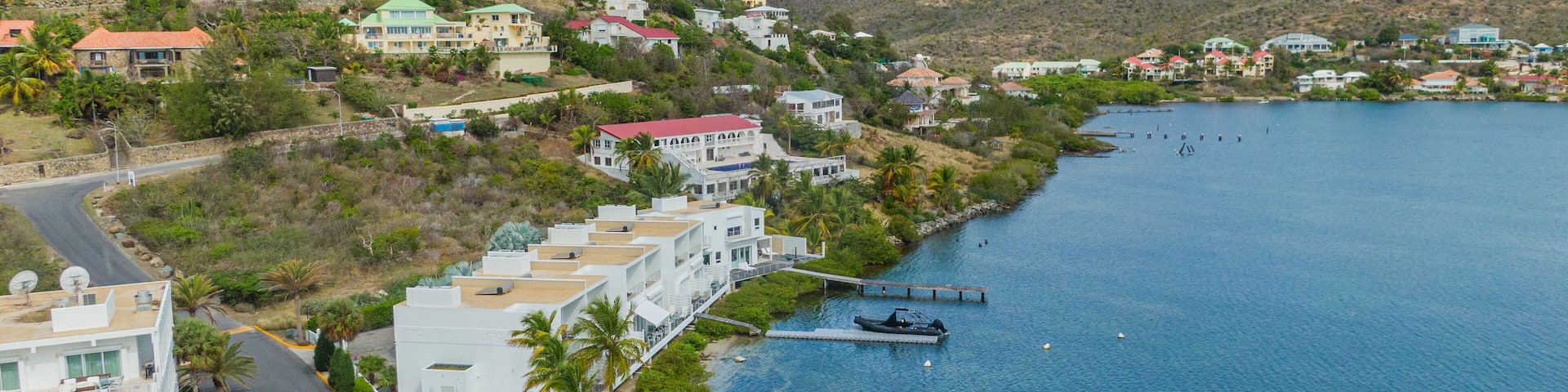 Dawn Beach which includes general coastal views and a coastal town