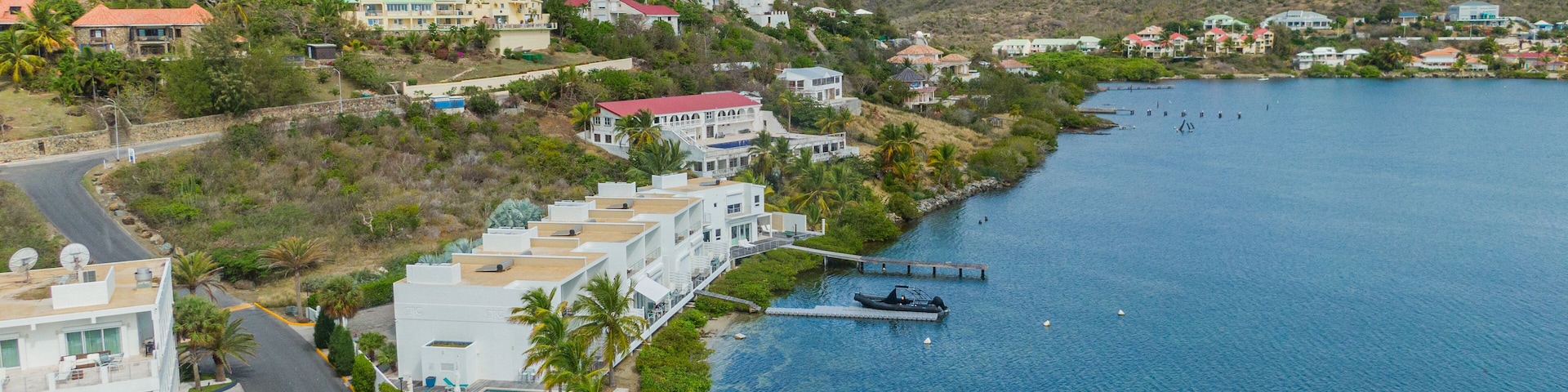 Dawn Beach which includes general coastal views and a coastal town
