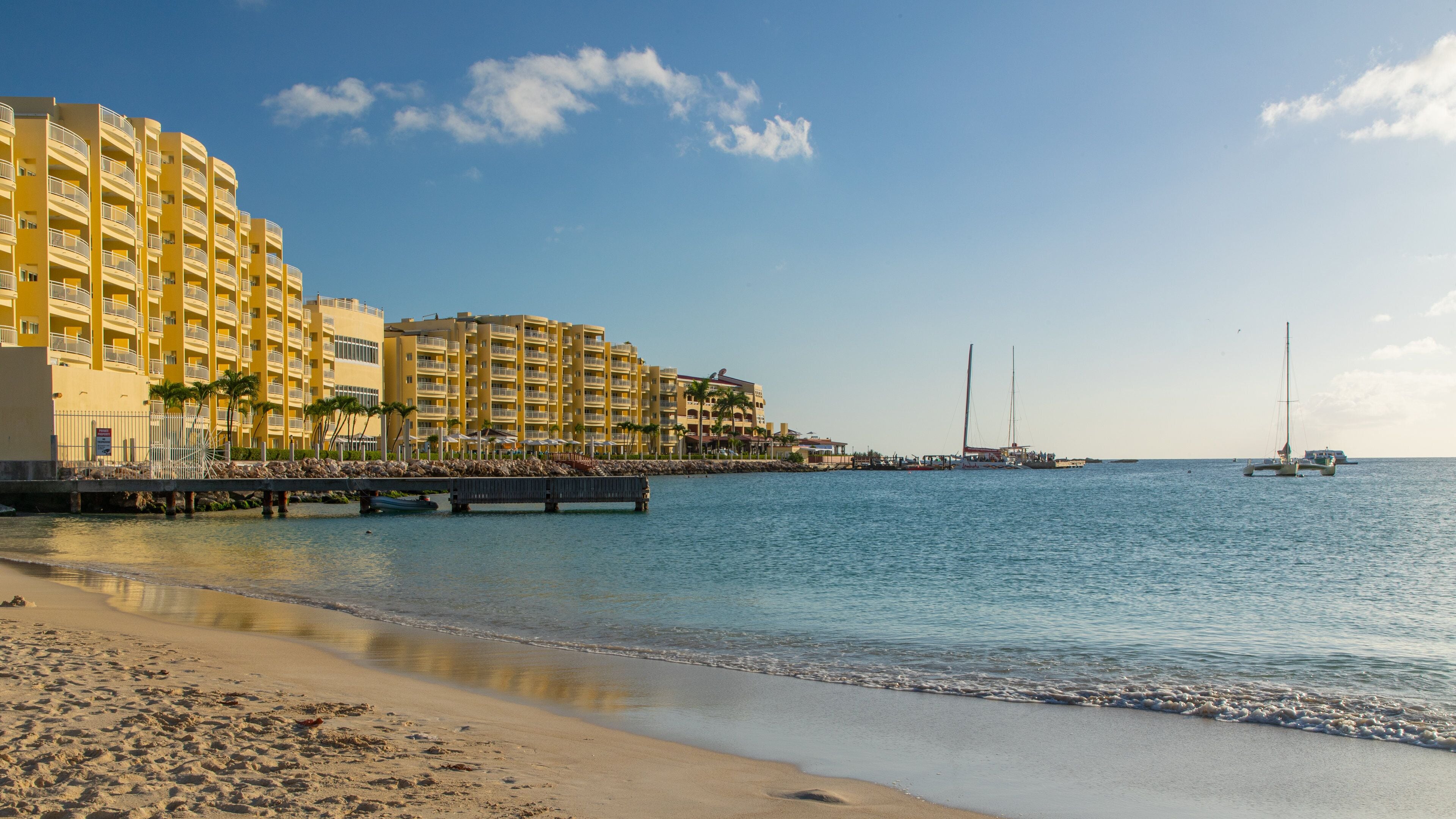 Kim Sha Beach featuring a beach, a coastal town and general coastal views