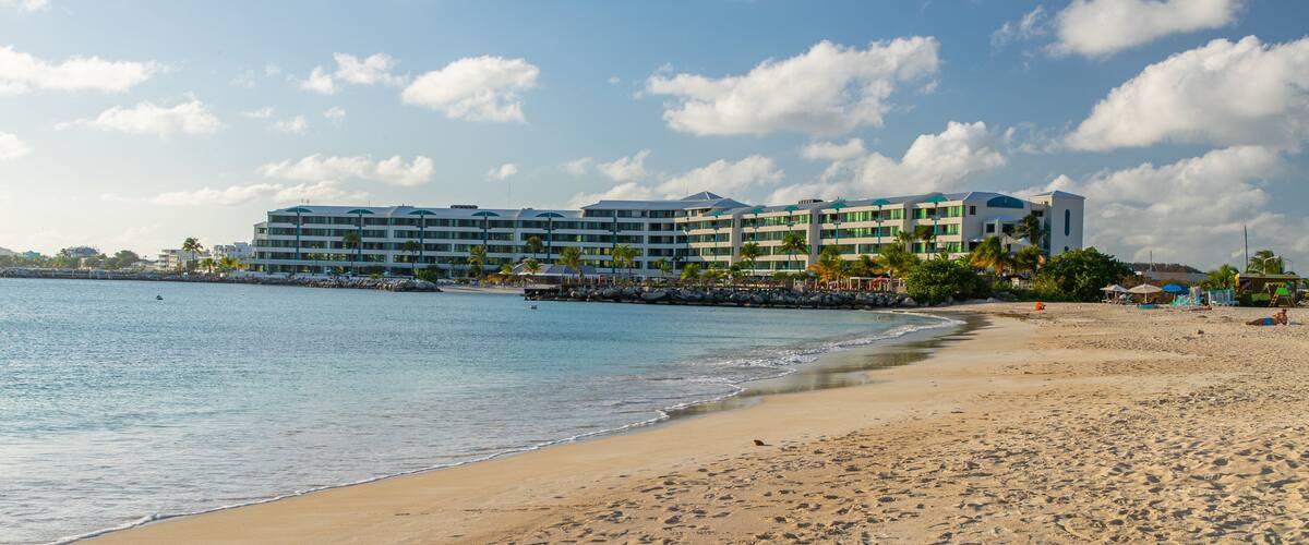 Kim Sha Beach featuring a beach, a coastal town and general coastal views