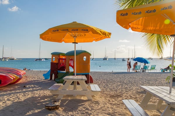 Kim Sha Beach featuring a sandy beach, a sunset and general coastal views