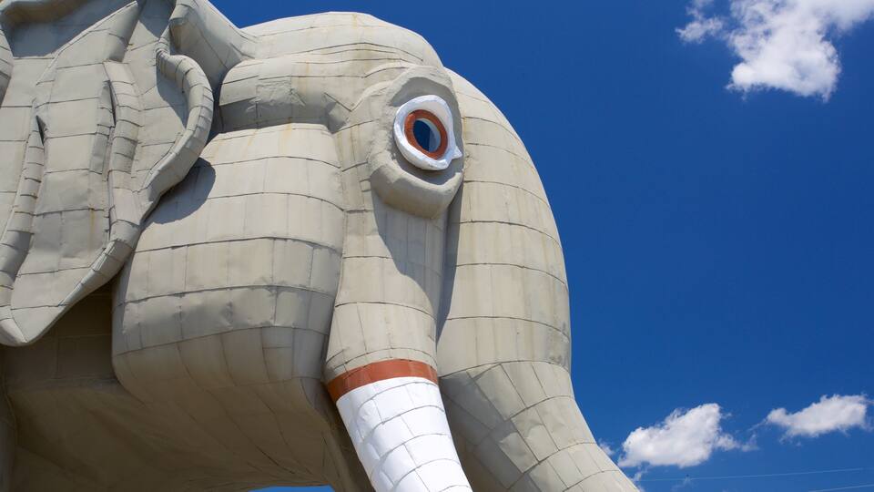 A large elephant sculpture with a prominent eye and tusks.