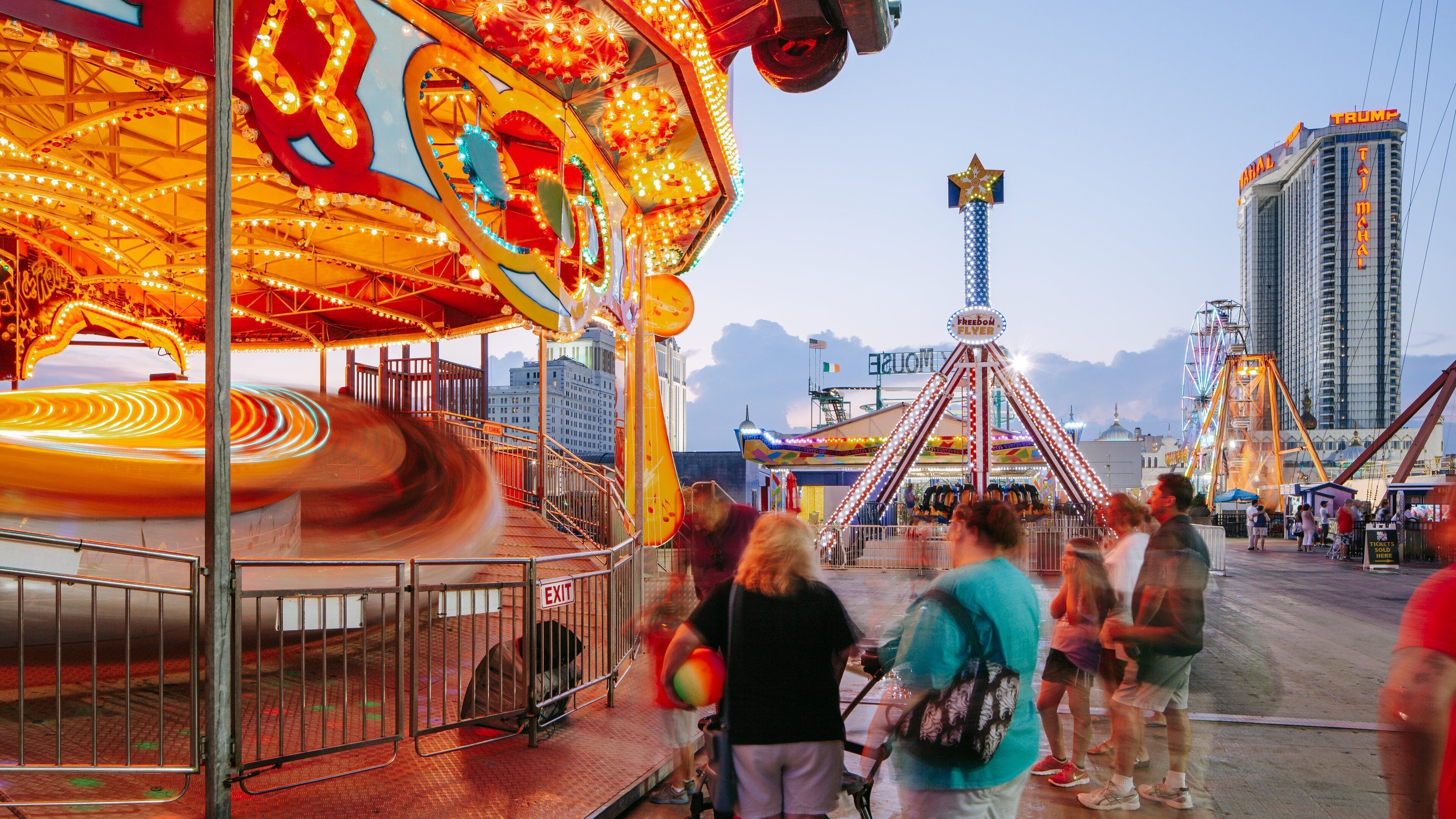 Steel Pier which includes rides as well as a small group of people