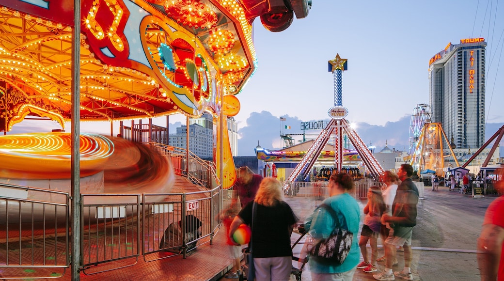 Steel Pier which includes rides as well as a small group of people