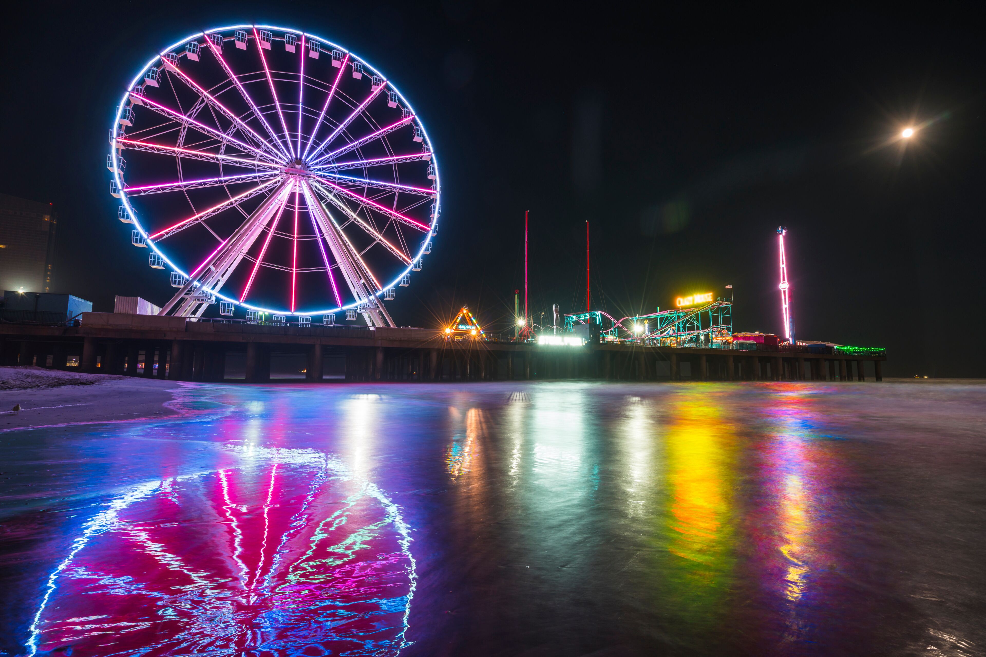steel pier with reflection at night,Atlantic city,new jersey,usa.