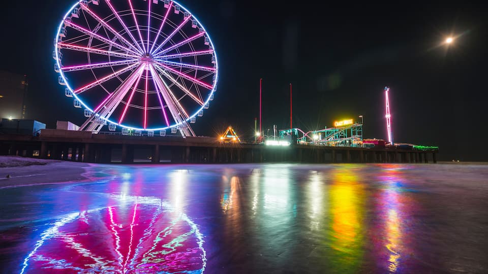 steel pier with reflection at night,Atlantic city,new jersey,usa.
