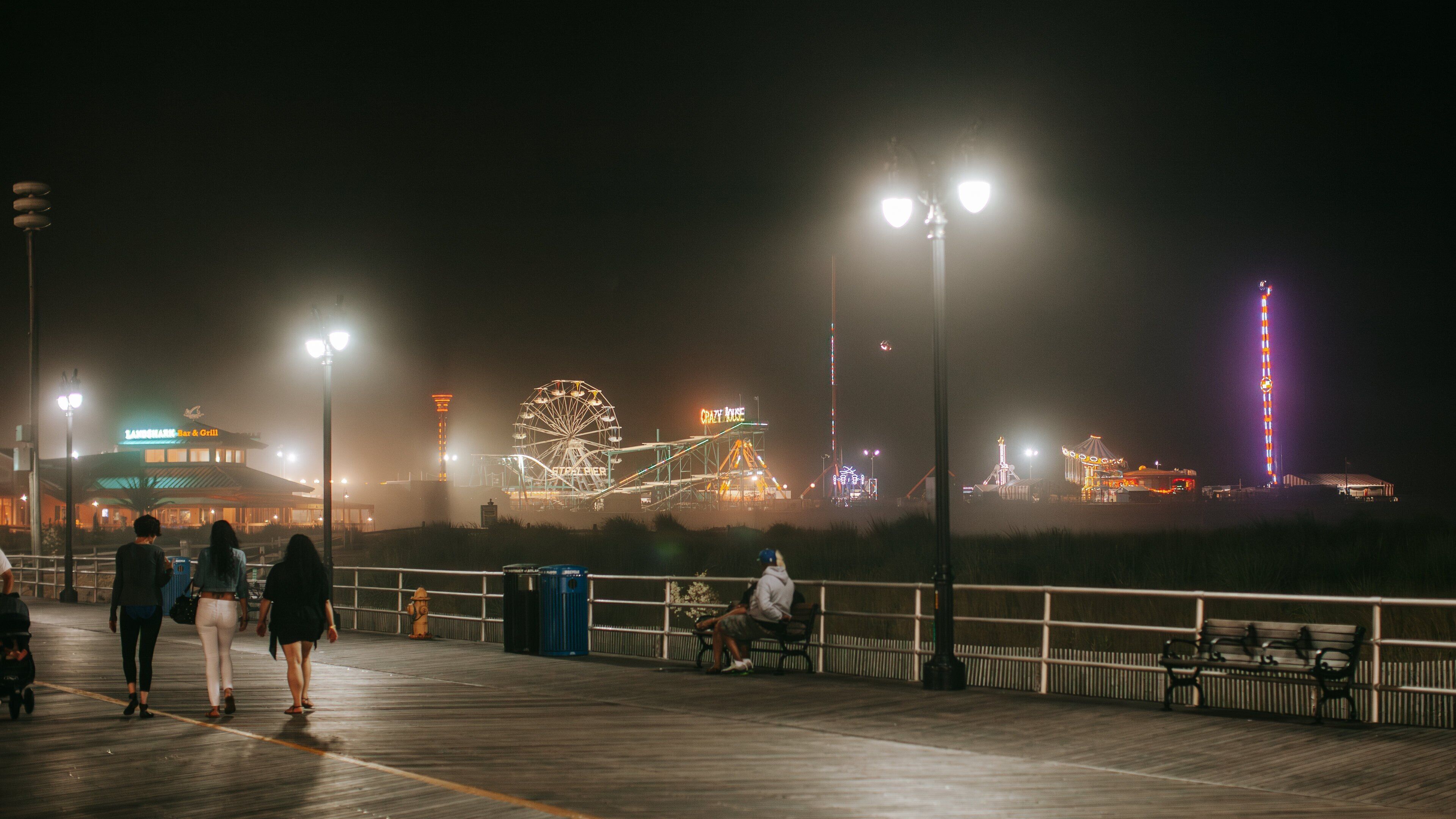 Steel Pier featuring night scenes
