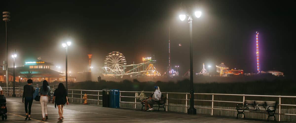 Steel Pier featuring night scenes