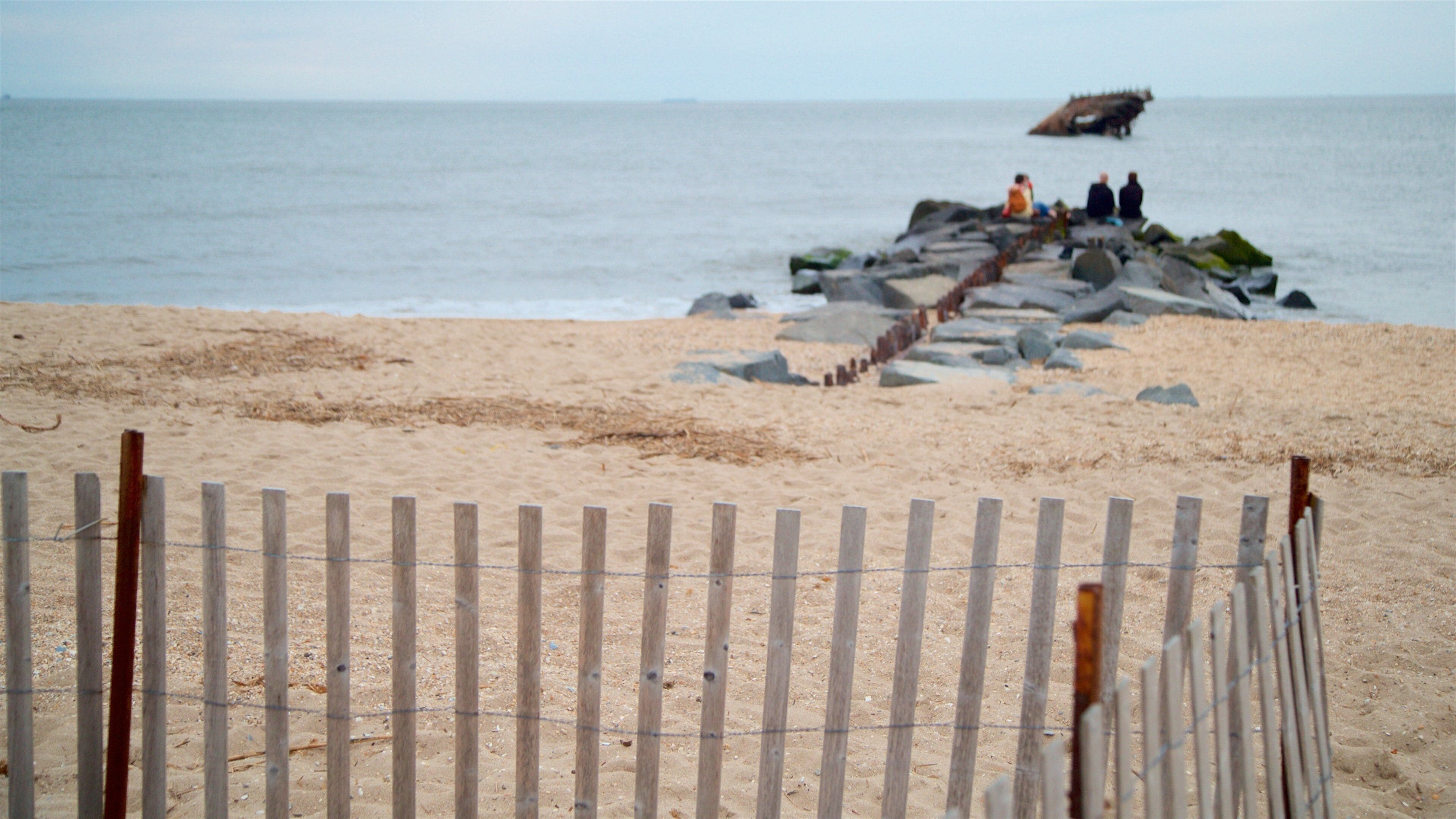 Sunset Beach som inkluderer sandstrand og kyst