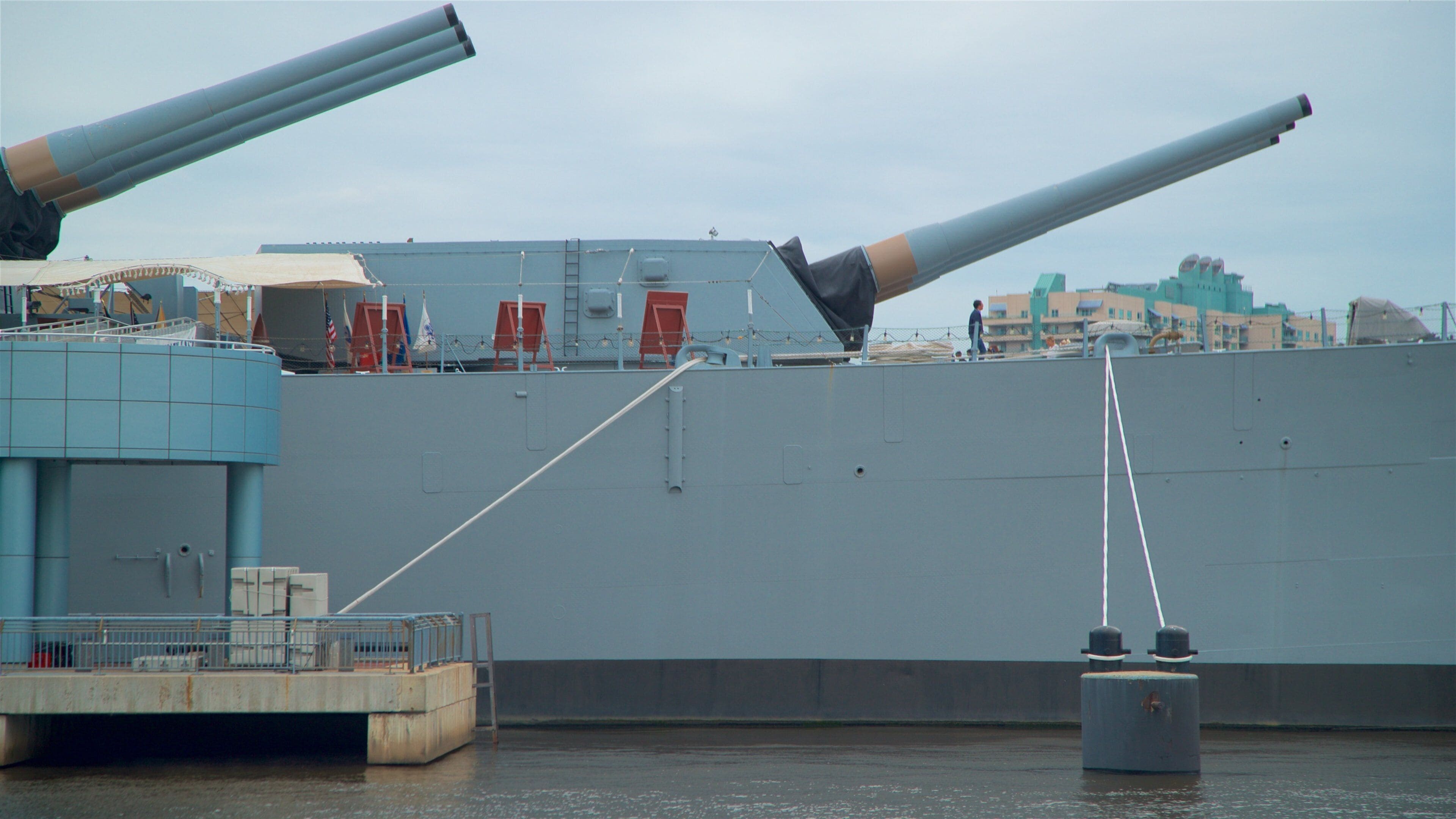 Battleship New Jersey showing a marina and military items
