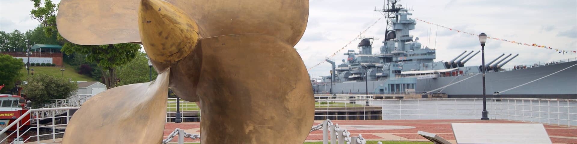Wiggins Park and Marina which includes a marina, military items and outdoor art