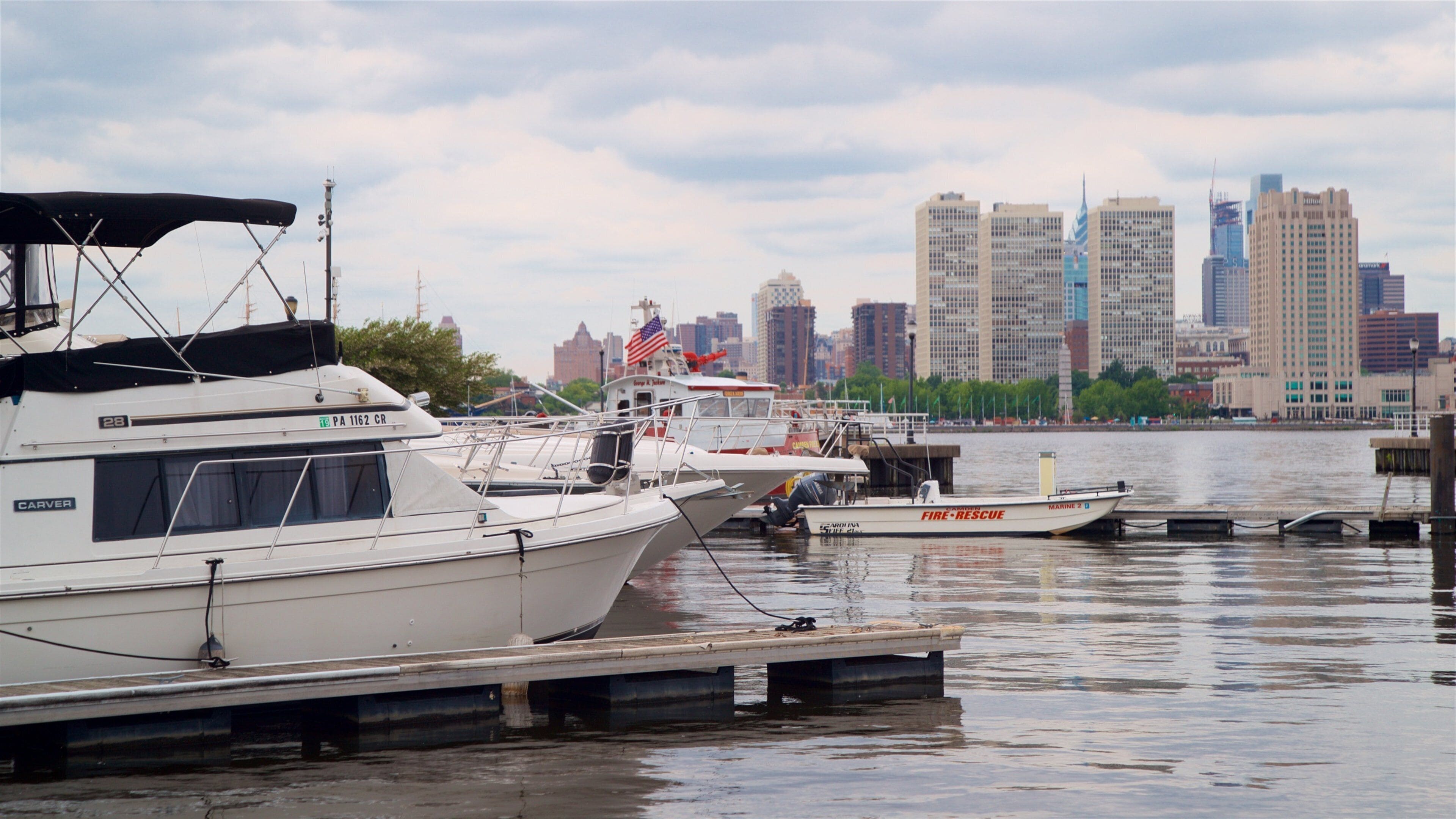 Wiggins Park and Marina featuring a city, a bay or harbour and a high-rise building