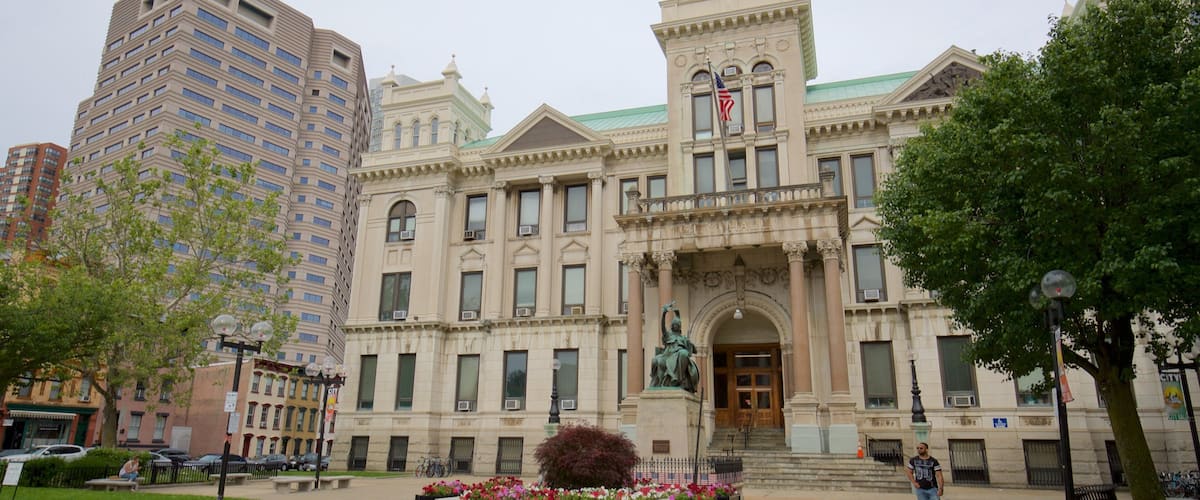 Jersey City City Hall featuring a garden, a city and heritage architecture