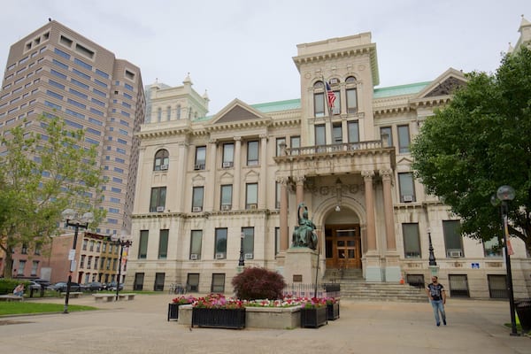 Jersey City City Hall which includes a city, a garden and flowers