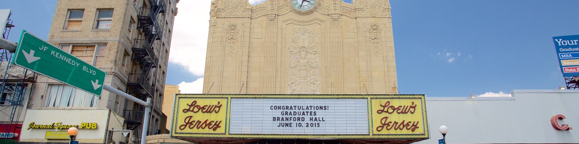 Loew\'s Jersey Theater showing theater scenes, a city and signage