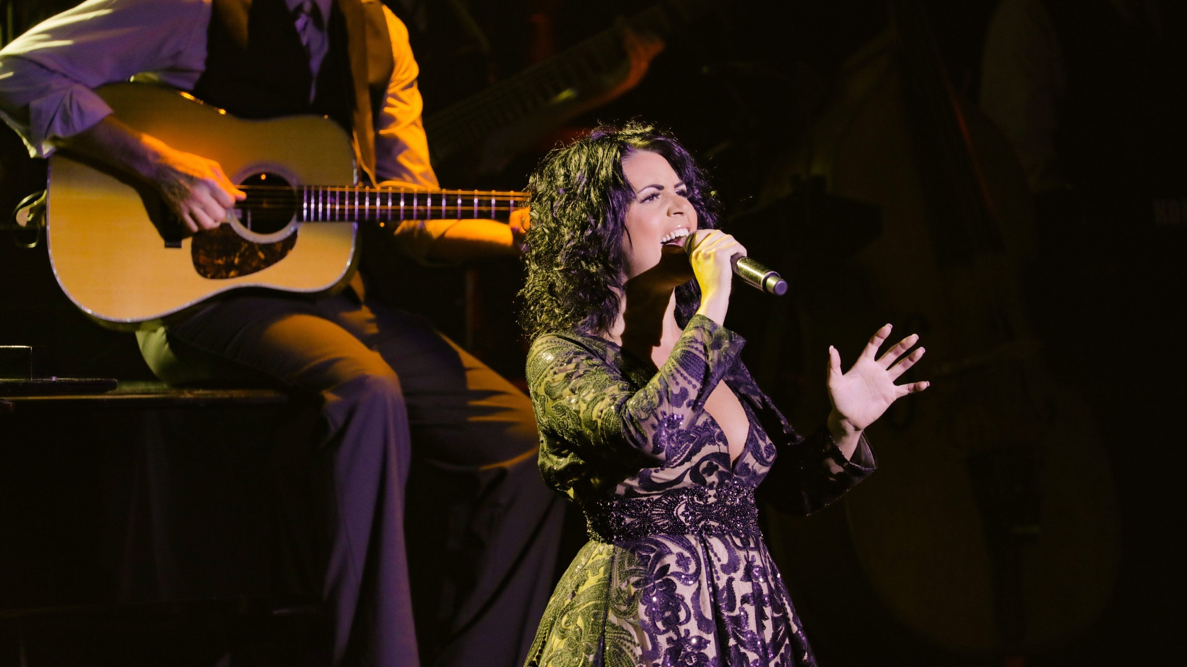 The Carolina Opry showing performance art and music as well as an individual femail