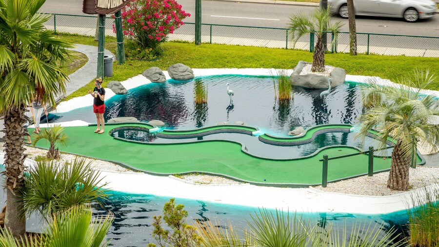 Mount Atlanticus Miniature Golf featuring golf as well as an individual femail
