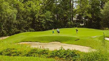 Caledonia Golf and Fish Club which includes golf as well as a small group of people