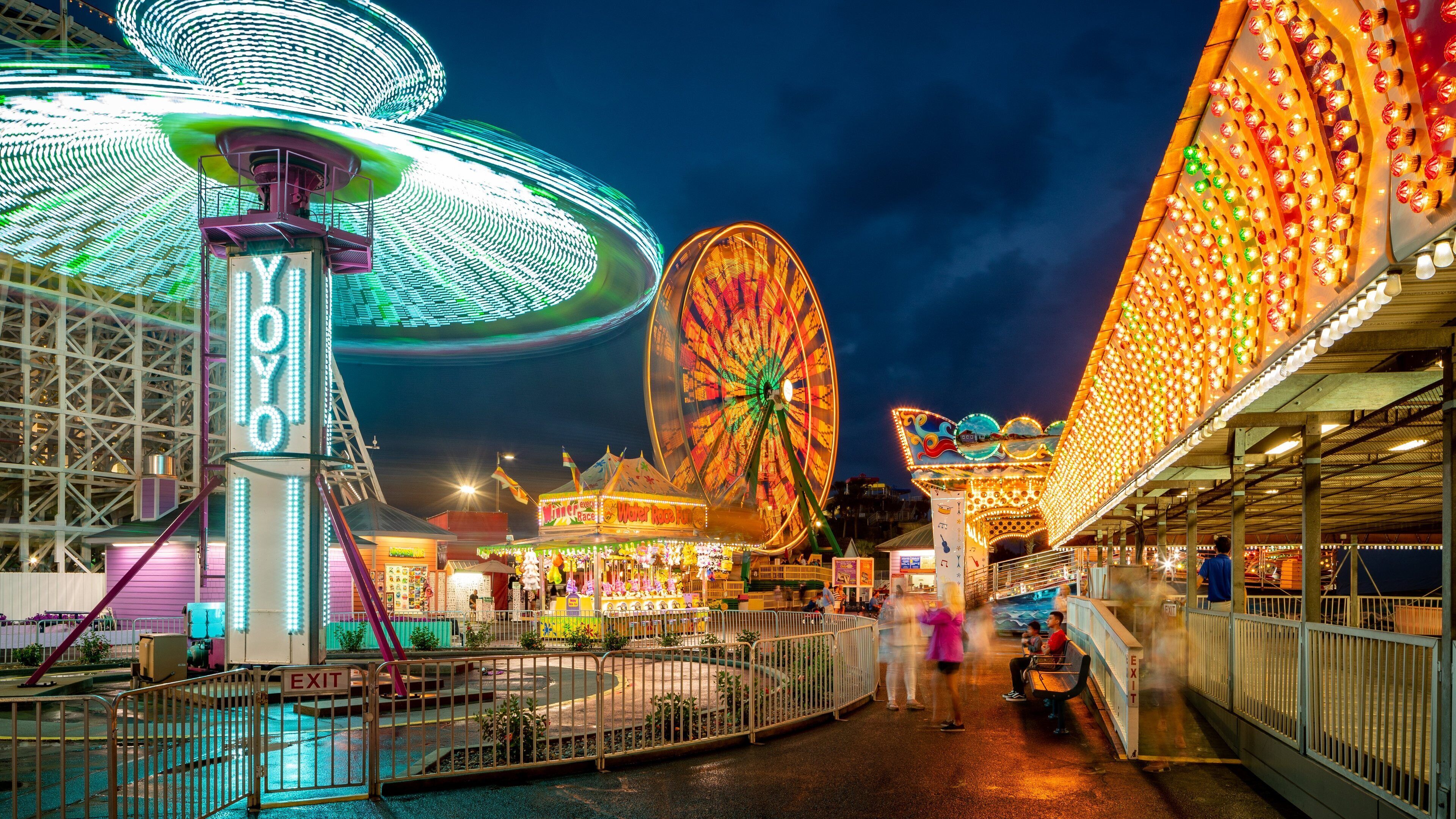 Family Kingdom Amusement Park featuring rides and night scenes