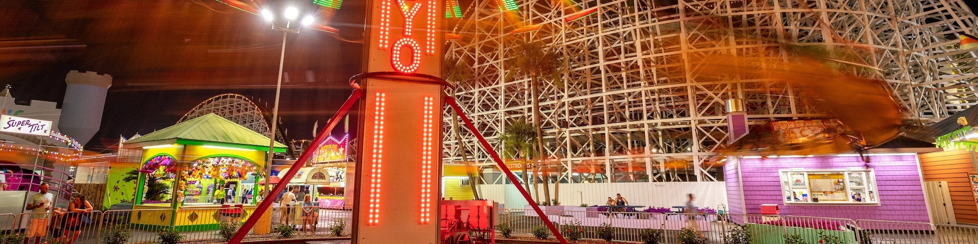 Family Kingdom Amusement Park which includes signage, rides and night scenes