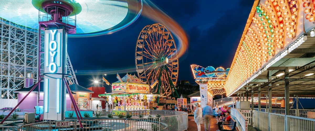 Family Kingdom Amusement Park which includes night scenes and rides