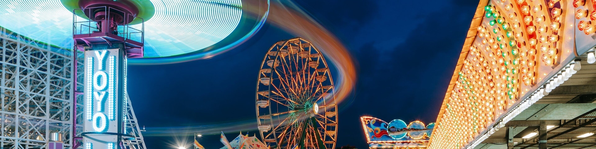 Family Kingdom Amusement Park which includes night scenes and rides