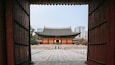 Deoksugung Palace which includes a temple or place of worship, heritage architecture and a square or plaza