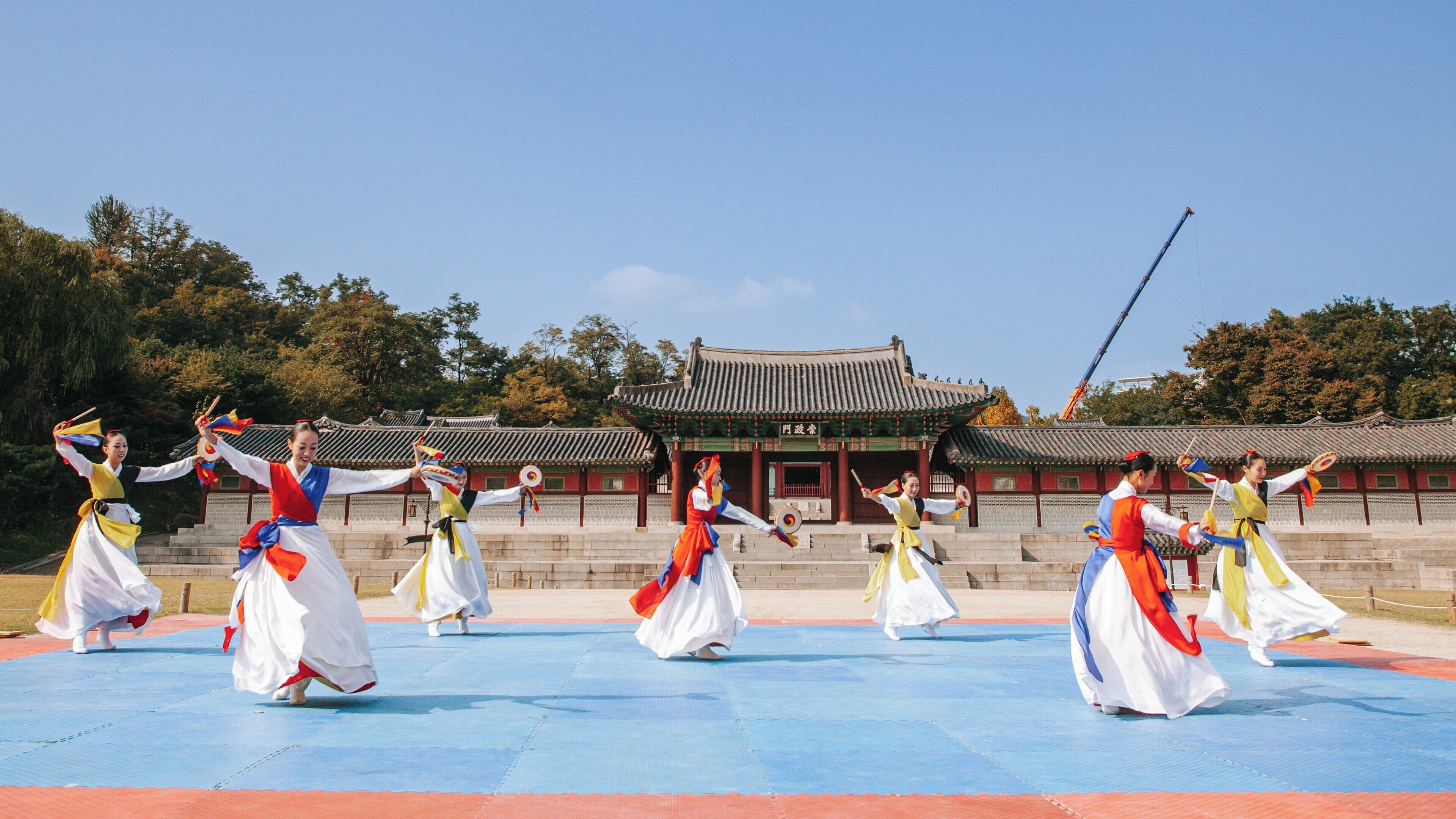 Traditional dance performance at Gyeongbokgung Palace in Seoul South Korea showcasing cultural heritage and vibrant costumes