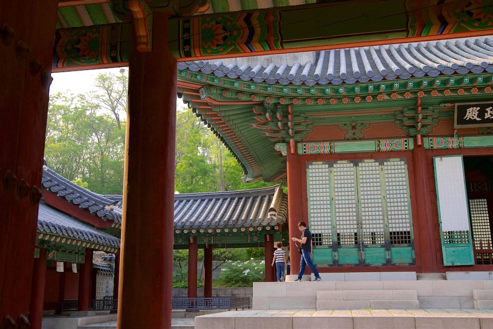 Traditional Korean architecture with ornate roofs and wooden structures.