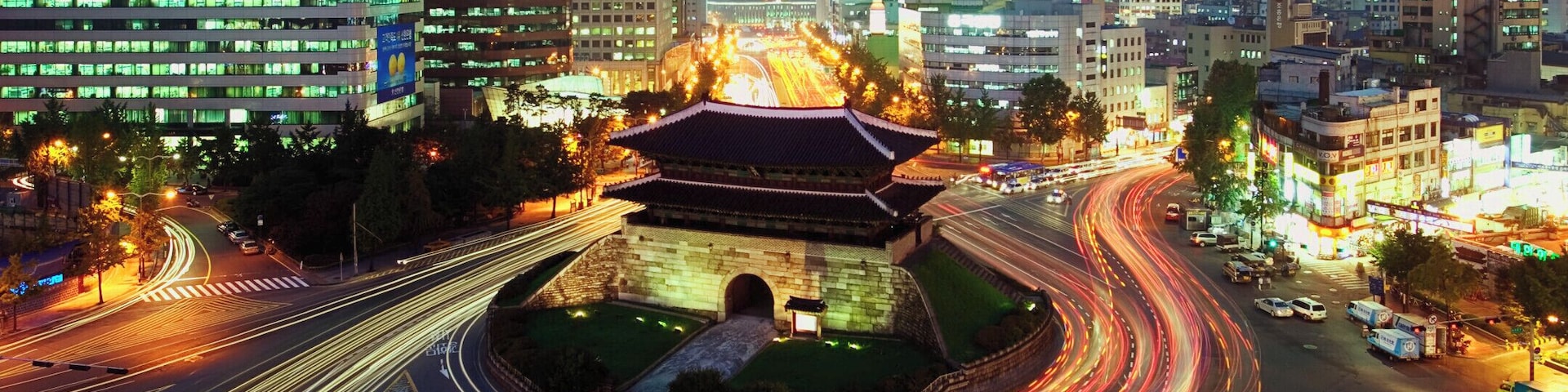 South Korea, Seoul, Namdaemun Gate and traffic, dusk, elevated view