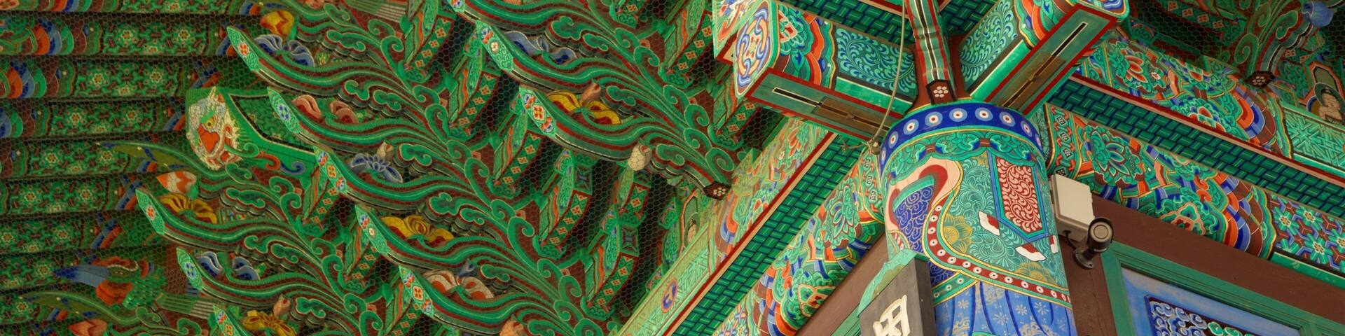 A detailed ceiling with intricate patterns and designs.