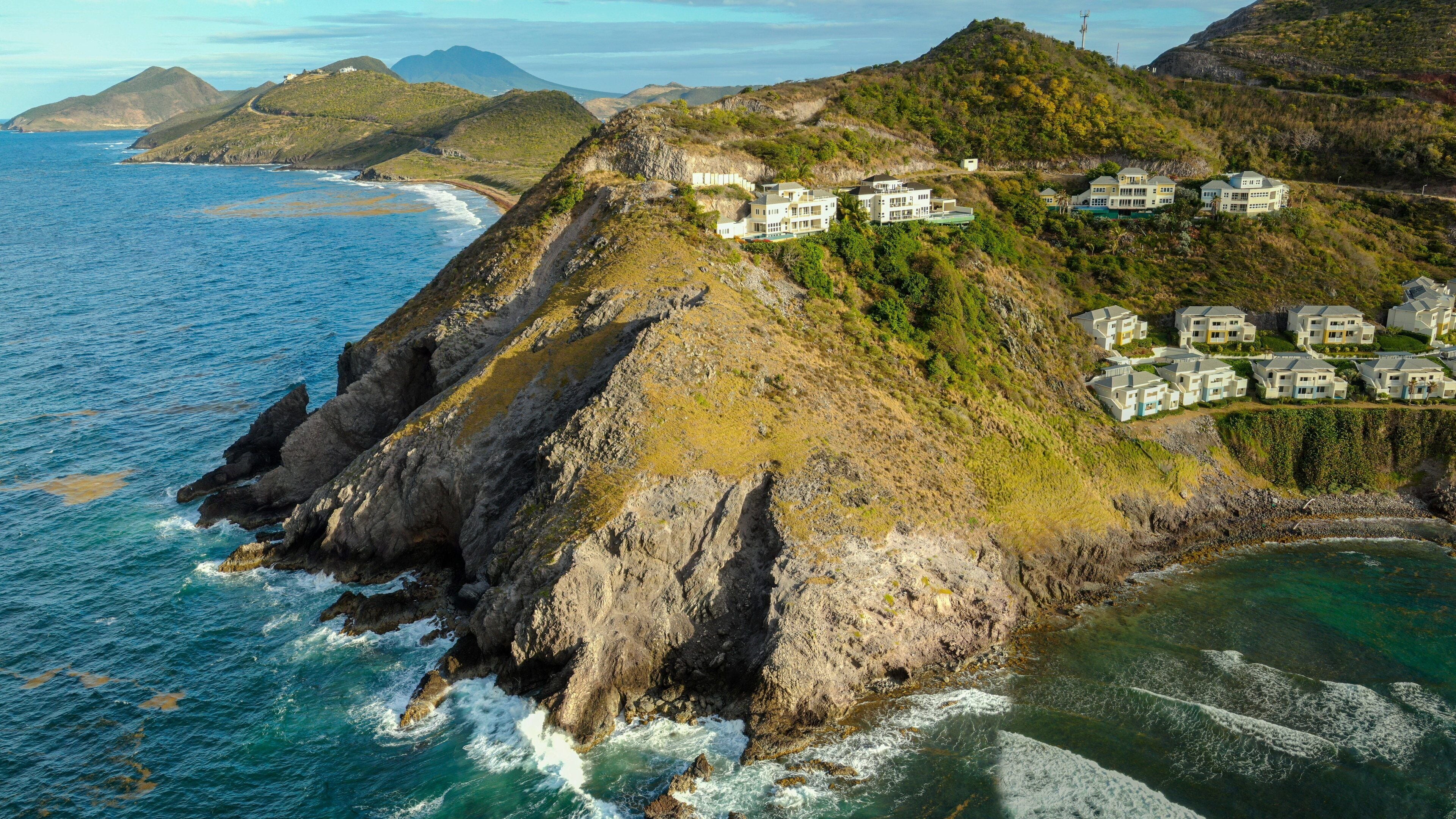 Timothy Hill showing general coastal views, a coastal town and rocky coastline