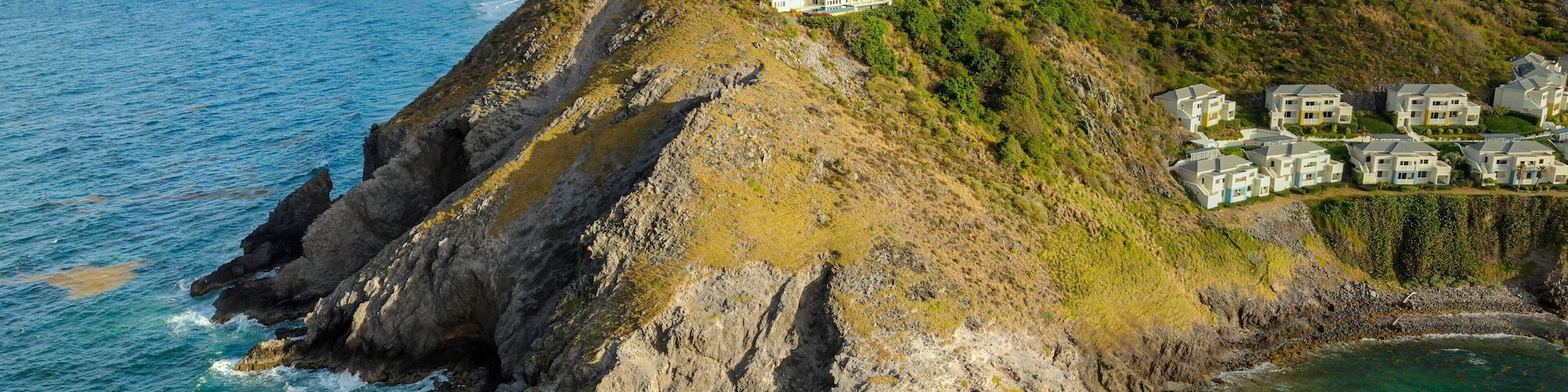 Timothy Hill showing general coastal views, a coastal town and rocky coastline