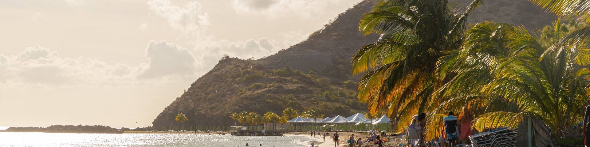 South Friar\'s Beach featuring a sandy beach, tropical scenes and a sunset