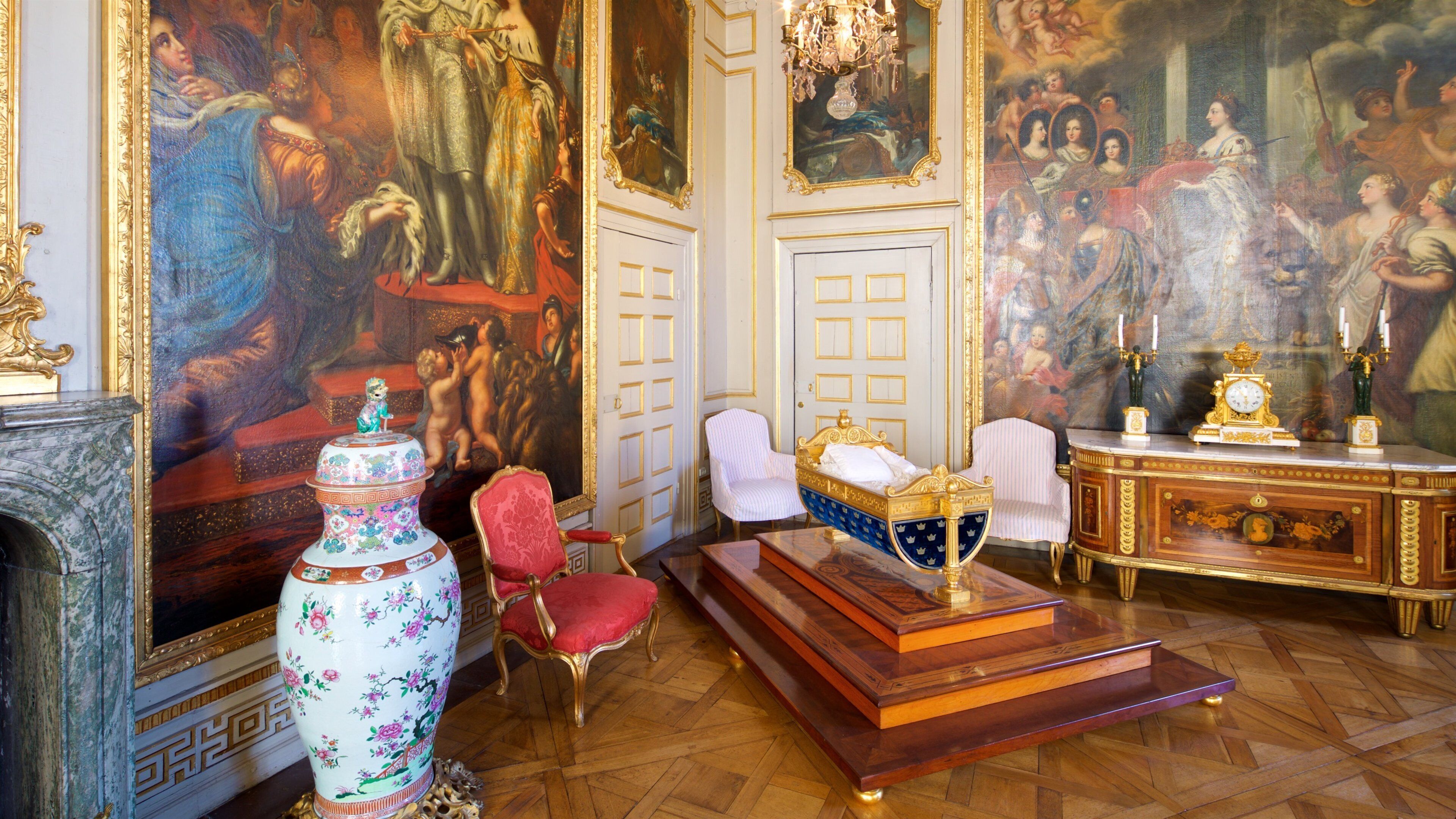 Drottningholm Palace featuring interior views, chateau or palace and art