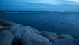 Oresund Bridge featuring a bridge, night scenes and rocky coastline