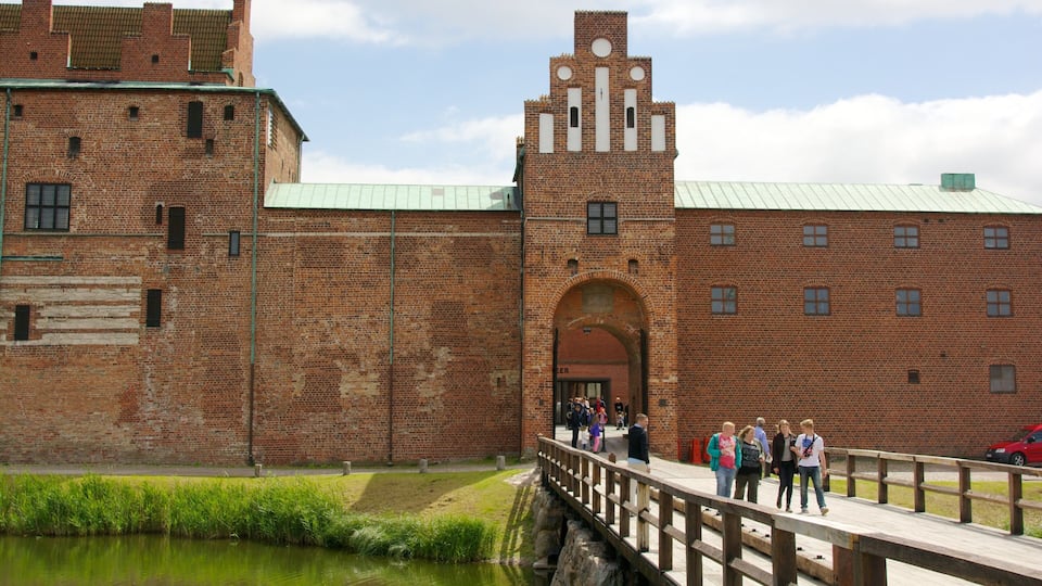 Malmo Castle which includes a castle, a bridge and heritage architecture