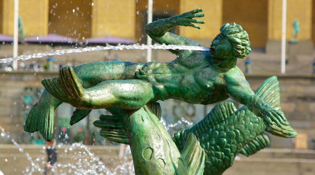 Poseidon Statue showing a statue or sculpture and a fountain