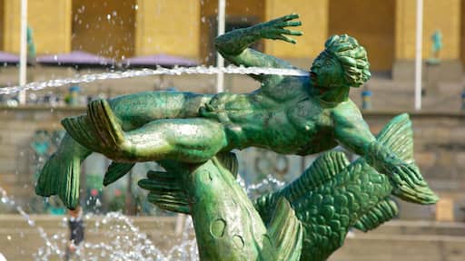 Poseidon Statue showing a statue or sculpture and a fountain