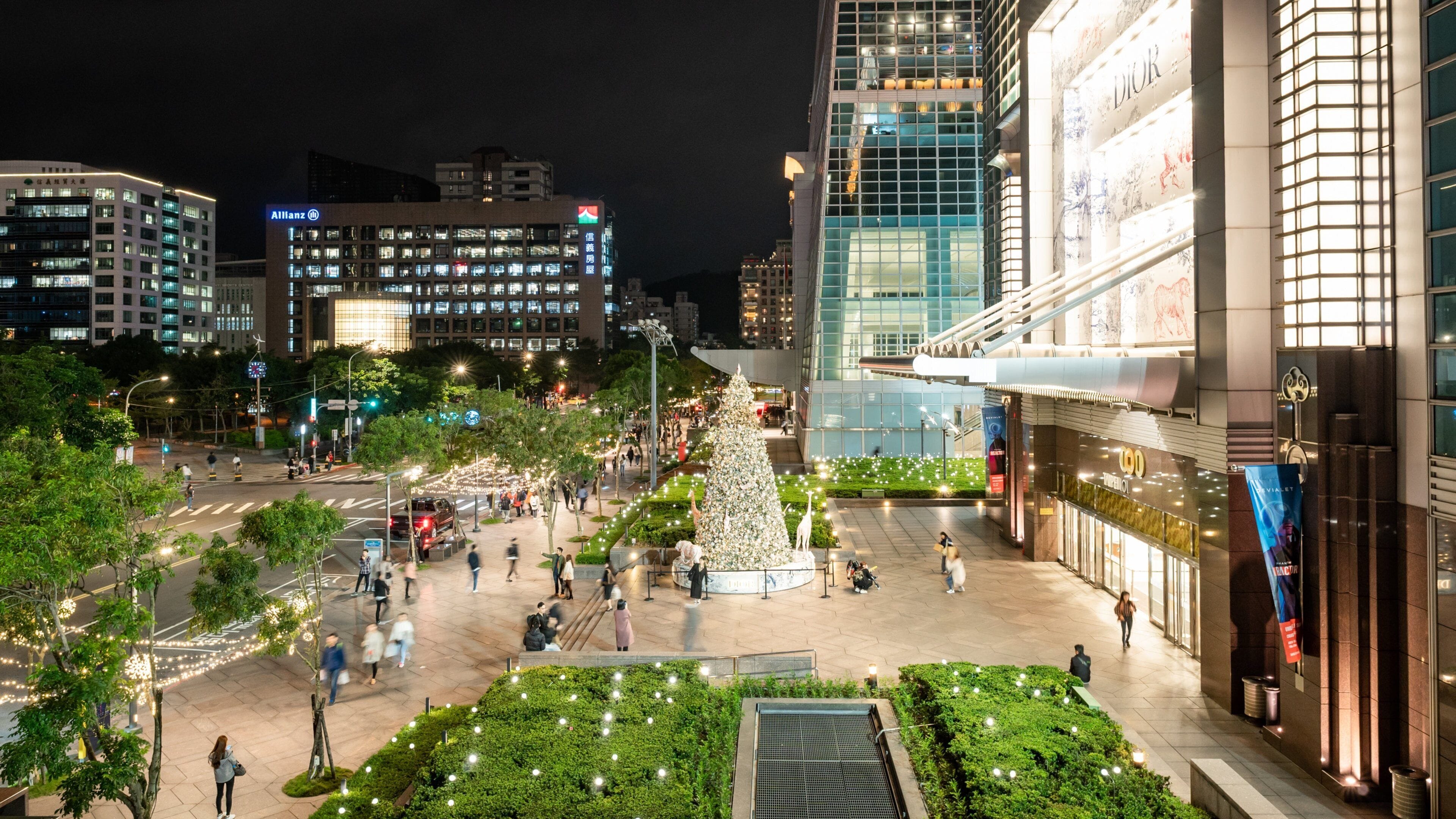 Taipei 101 which includes a square or plaza, night scenes and a city