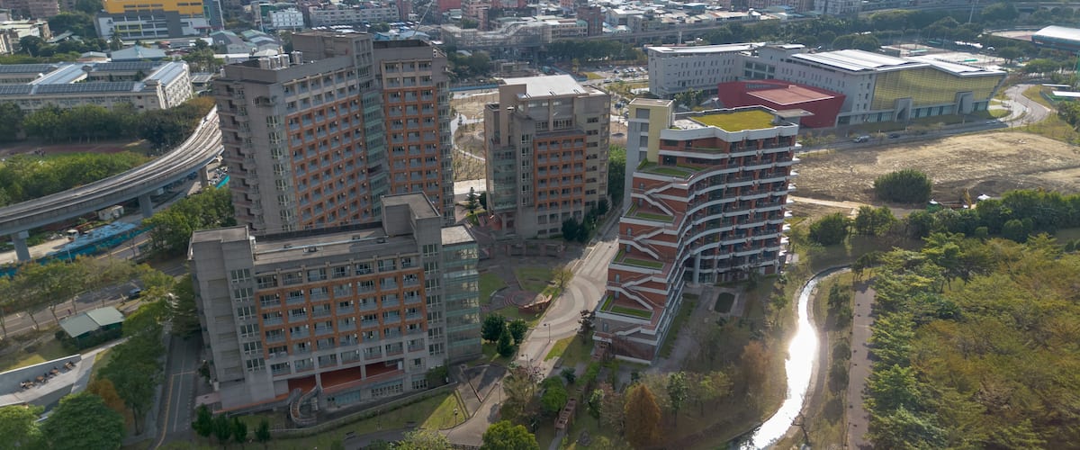 Dormitory of National Taipei University Aerial View at Sanxia, New Taipei City, Taiwan. Beautiful campus with sunset and green grass.