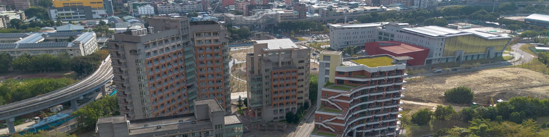 Dormitory of National Taipei University Aerial View at Sanxia, New Taipei City, Taiwan. Beautiful campus with sunset and green grass.