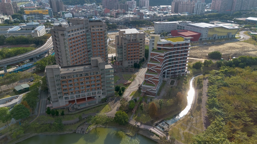 Dormitory of National Taipei University Aerial View at Sanxia, New Taipei City, Taiwan. Beautiful campus with sunset and green grass.