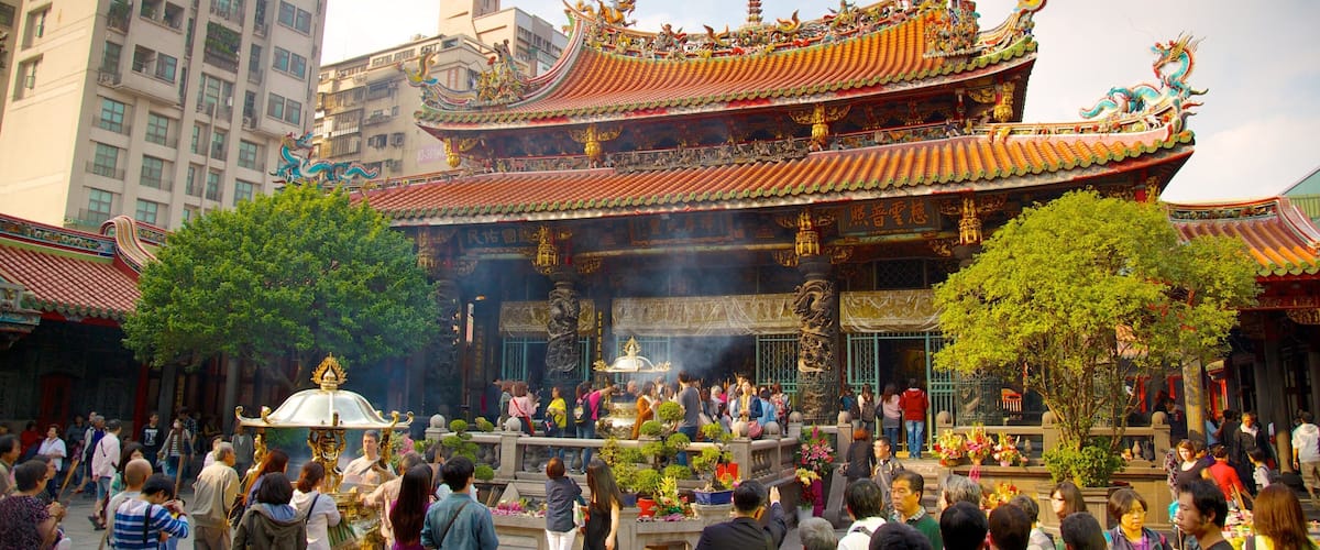 Longshan Temple featuring a city, religious elements and a temple or place of worship