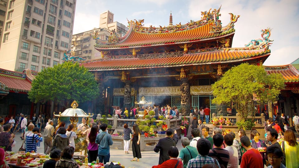 Longshan Temple showing a temple or place of worship, a city and religious elements